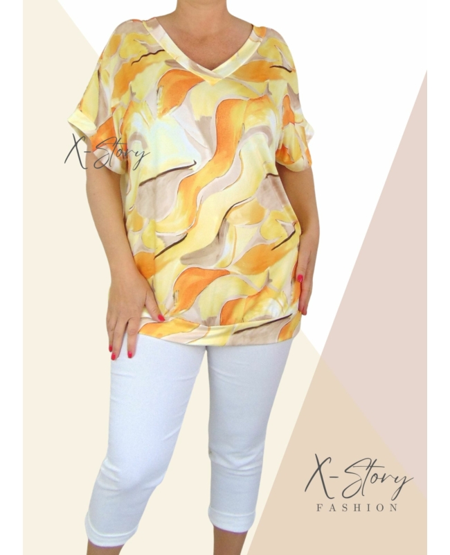 Elöl-hátul "V" kivágott , bő fazonú, alul passzés felső